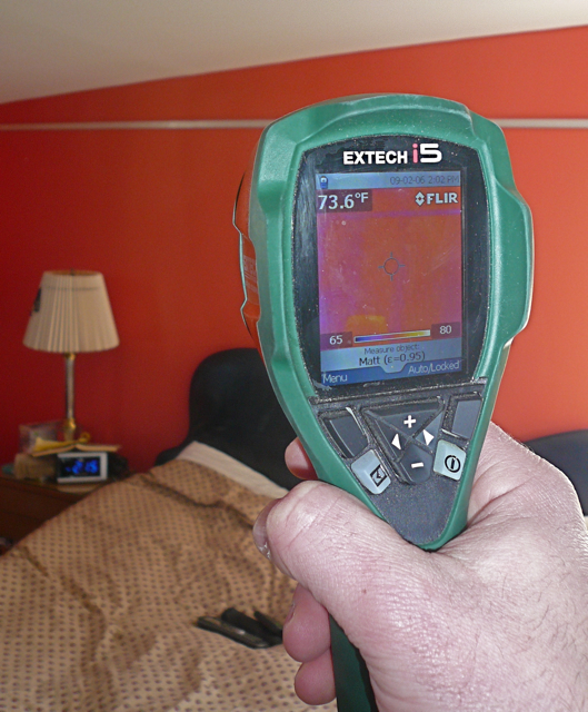 The thermal imaging device. Darker images indicate colder temps. It also offers a digital temp. readout (upper left of screen).